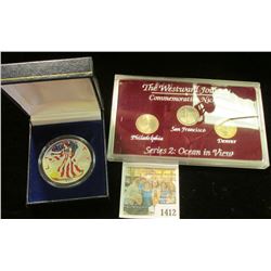 1412 _ 2001 Colored Silver American Eagle One Ounce in a special box; & a 2005 P, D, & S Proof and B