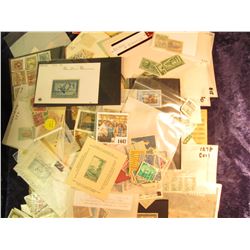 1447 _ Box full of Old unsorted Postage Stamps.
