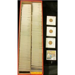 1504 _ Red 14" Double Row Stock Box 80% full of carded, ready for Flea Market 1956-57 Wheat Cents.