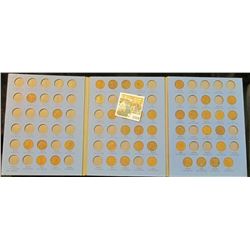 1534 _ 1911-40 Partial Set of Lincoln Head Cents in a blue Whitman folder. Needs some serious calcul