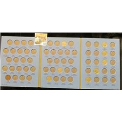 1572 _ 1918-37 Partial Set of Buffalo Nickels in a blue Whitman folder. (8 pcs.)