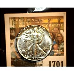 1701 _ 1943 P Walking Liberty Half Dollar, consignor had graded GEM BU 65. Have a good look and if y