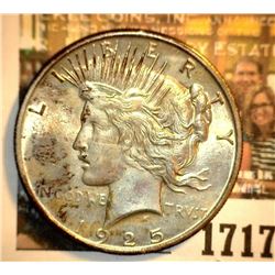 1717 _ 1925 P U.S. Silver Peace Dollar, Choice BU 64. Gold toning.