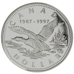 1997 $1 silver dollar cased with the original outer box.
