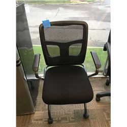 Office black chair on wheels with back mesh