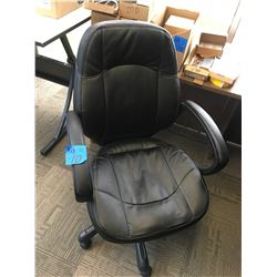 Black leather office chair, adjustable on wheels