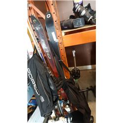LOT OF SKI BOOTS AND POLES