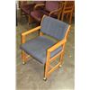 Image 1 : ROLLING WOOD FRAMED CHAIR