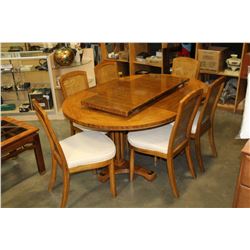 ROUND WALNUT DINING TABLE W/ 2 LEAFS AND 6 CHAIRS