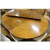 Image 2 : ROUND WALNUT DINING TABLE W/ 2 LEAFS AND 6 CHAIRS