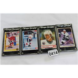 4 VINTAGE WAYNE GRETZKY CARDS IN CASES