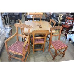 OAK CRANK DINING TABLE W/ CARVED LEGS AND 6 CHAIRS
