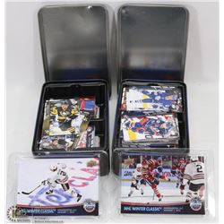2 TINS OF ASSORTED HOCKEY CARDS.