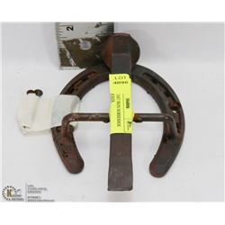 ANTIQUE CAST IRON HORSESHOE DOOR KNOCKER.