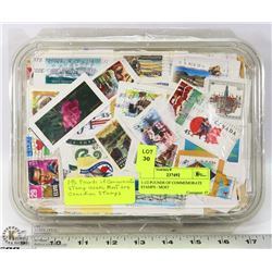 1-1/2 POUNDS OF COMMEMORATE STAMPS - MOST