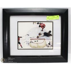 AUTOGRAPHED TAYLOR HALL NEW JERSEY PHOTO