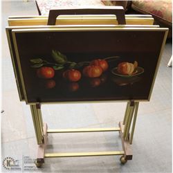 SET OF 4 VINTAGE TV TRAYS ON STAND WITH CASTORS