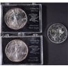 Image 1 : 2-1988 SILVER EAGLES & 1 2015 PHILHARMONIC BU COIN