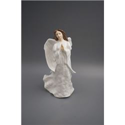 A Royal Doulton England porcelain figurine with production number.