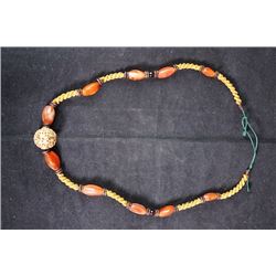 An old agate necklace + a gilt beads