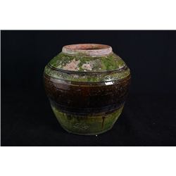 Qing Dynasty, a green glaze jar.