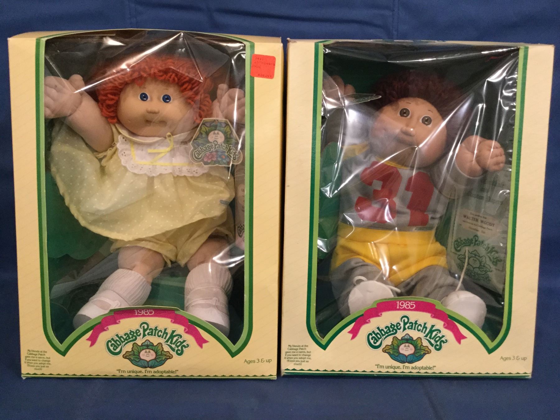 2 1985 Cabbage Patch Kid dolls with boxes and certificates Walter