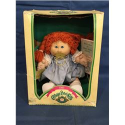 Cabbage Patch Kids box with doll and a certificate Darcie Monica in a 1985 box.