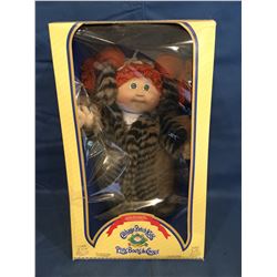 Cabbage Patch Doll in box marked "Couture Kids Collection"  P'tits Bouts de Choux and has certificat