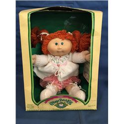 Cabbage Patch Kids box with doll and a certificate Frederica Laron   in a 1985 box.