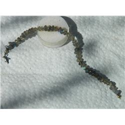 STRING OF ASSORTED POLISHED FREE FORM AND ROUND GEMS - LOOK LIKE MYSTIC TOPAZ - APPROX. 45PC ON STRA