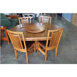 1 OAK ROUND TABLE W/ EXTENTION LAZY SUZAN AND 4 CHAIRS