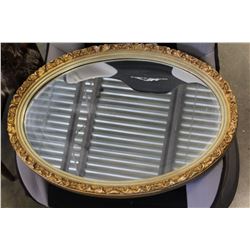 OVAL FRAMED MIRROR