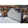 Image 2 : NEW ASHLEY SIGNATURE WOOD AND TAN FABRIC KINGSIZE BEDFRAME, WITH NAILHEAD ACCENT, RETAIL $2499