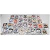 Image 1 : LOT OF 31 TEAM BAGS OF HOCKEY ROOKIE CARDS ,