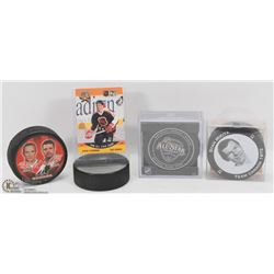 SET OF 4 HOCKEY PUCKS 2 SEALED