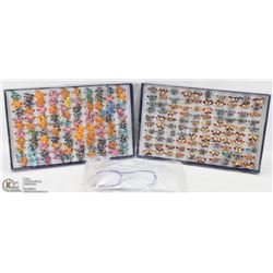 TWO DISPLAYS OF ASSORTED FASHION RINGS SOLD WITH