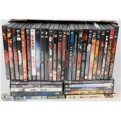 FLAT OF 35+ DVDS.