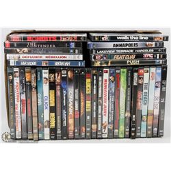 FLAT OF 35+ DVDS.