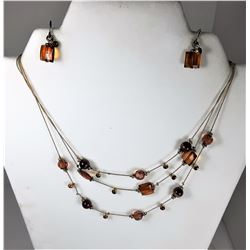 10 - GOLD TONE TRIPLE STRAND AMBER