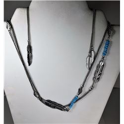 6)  SILVER TONE LONG CHAIN WITH LEAF &