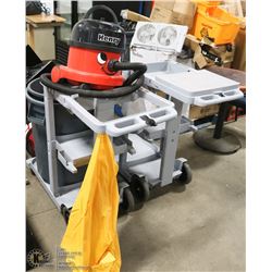 TWO CLEANING CARTS SOLD WITH HENRY VAC