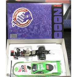 23) JOHN FORCE ACTION DIE CAST 2000 MUSTANG GRINCH