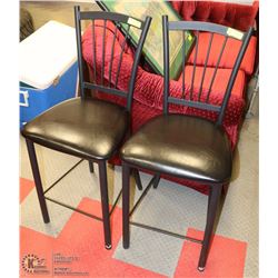 PAIR OF BLACK METAL AND LEATHERETTE BAR STOOLS