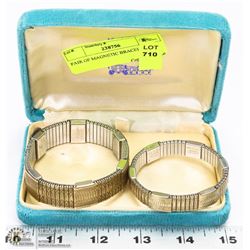 PAIR OF MAGNETIC BRACELETS.