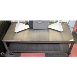 DISTRESSED METAL COFFEE TABLE ON CASTERS