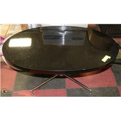BLACK TOP OVAL SHAPE COFFEE TABLE