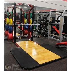 NAUTILUS SQUAT RACK WITH PLATFORM AND WEIGHTS
