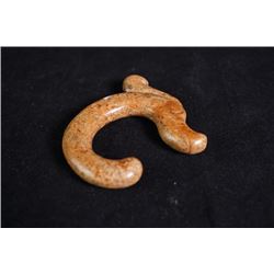 A pendant with "Dragon" pattern.