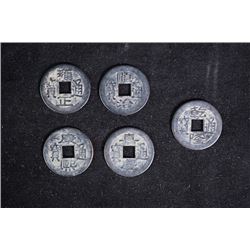 Five Chinese coins.