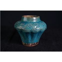 A blue-glazed jar